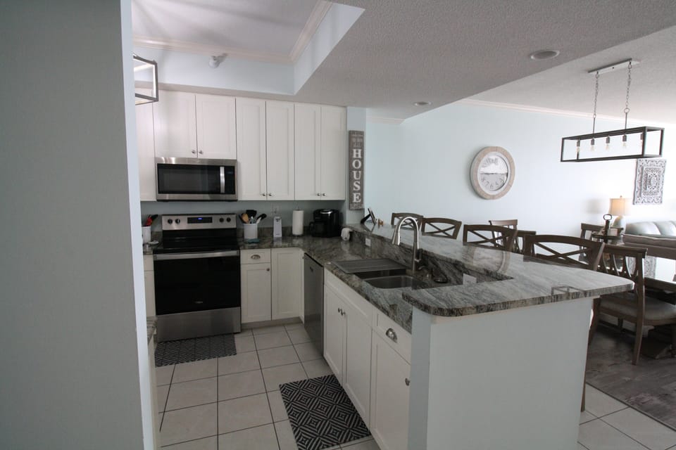 Granite counters & stainless steel appliances.