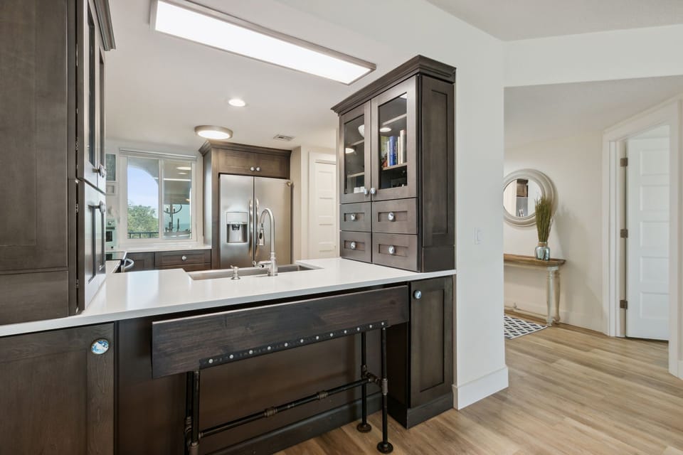 Totally Remodeled and Fully Equipped Kitchen with Stainless Steel Appliances, Beautiful Cabinetry, and Stunning Granite Countertops