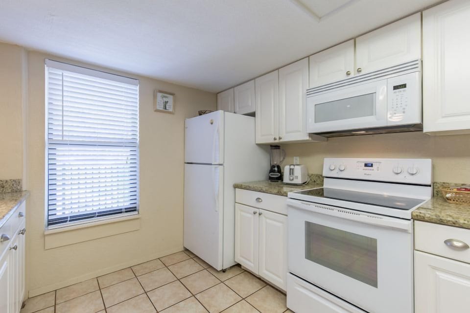 Prepare meals at your home-away-from-home in fully furnished kitchen
