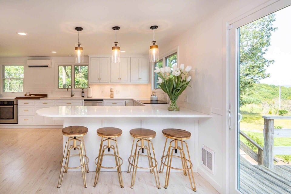 Kitchen Has Stainless Steel Appliances and a Breakfast Bar with Seating for 4 and Quartz Counters - 1st Floor