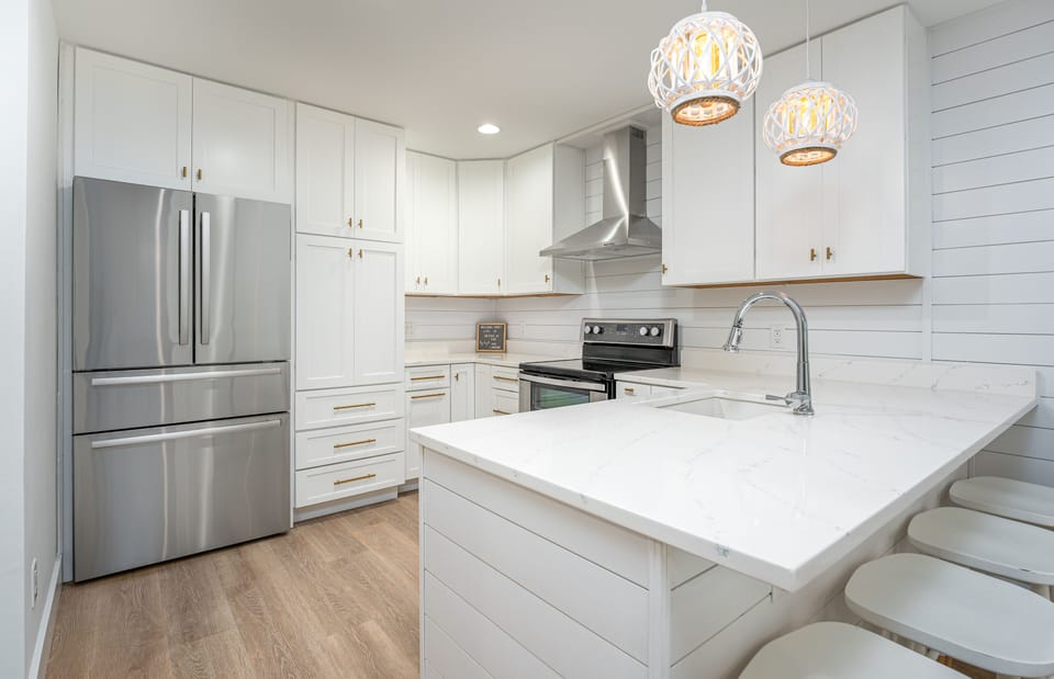 Custom kitchen with plenty of counter space and storage.