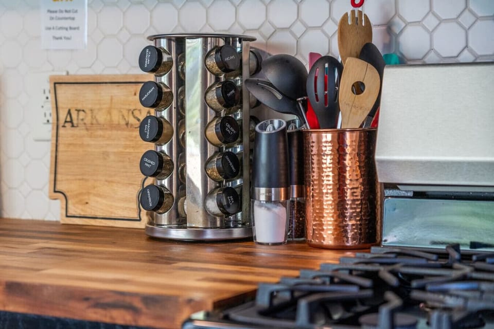 All of the spices and kitchenware you'll need.  There are pots & pans, cookie sheets and mixing bowls along with an airfryer, instapot, blender, rice cooker and mixer!  You have everything you need for a gourmet meal!
