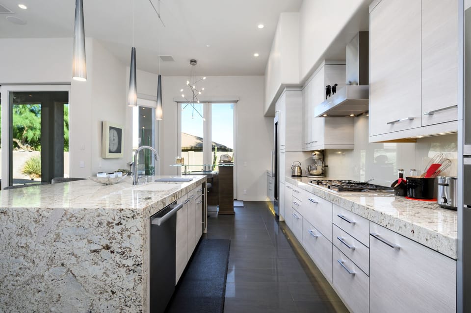 Fully equipped kitchen with gas stove.