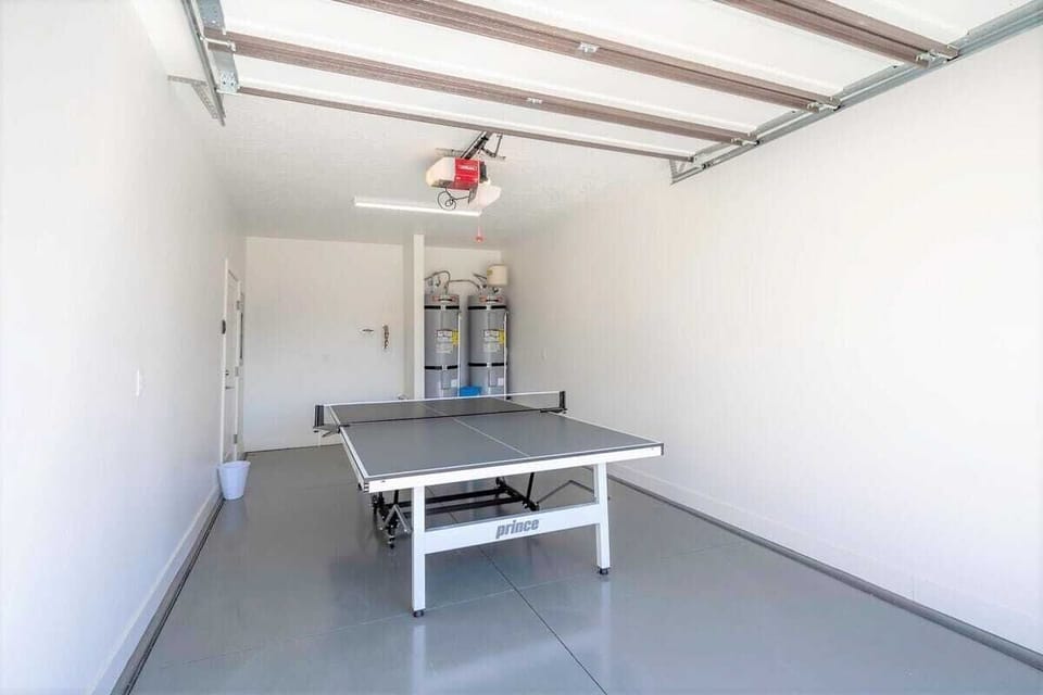 Enjoy ping pong in garage that folds up for parking