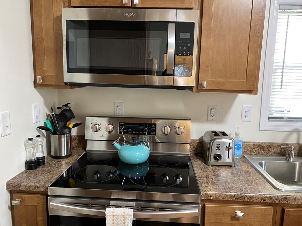 Nice clean kitchen with all the convenience of the home.