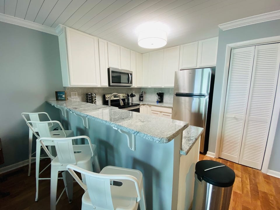Updated kitchen with brand new appliances and granite countertops 