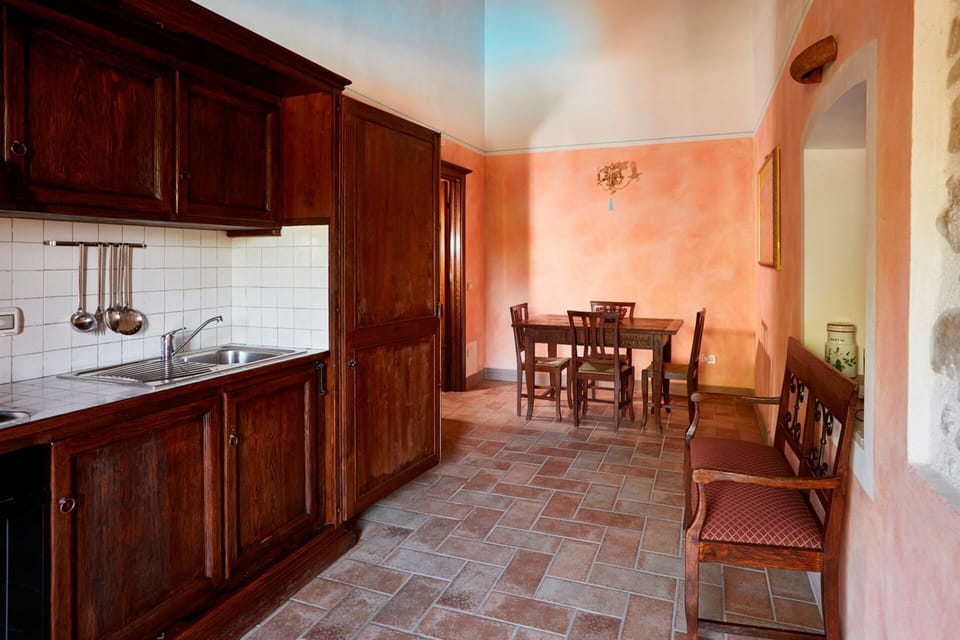 Cabinetry, Furniture, Property, Countertop, Wood, Interior Design, Table, Lighting, Kitchen, Architecture