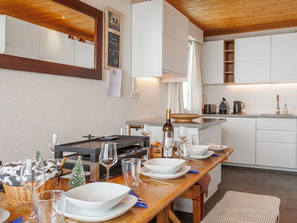 Furniture, Kitchen, Countertop, Interior Design, Flooring, Kitchen Appliance, Wood, Cabinetry, Ceiling, Light Fixture