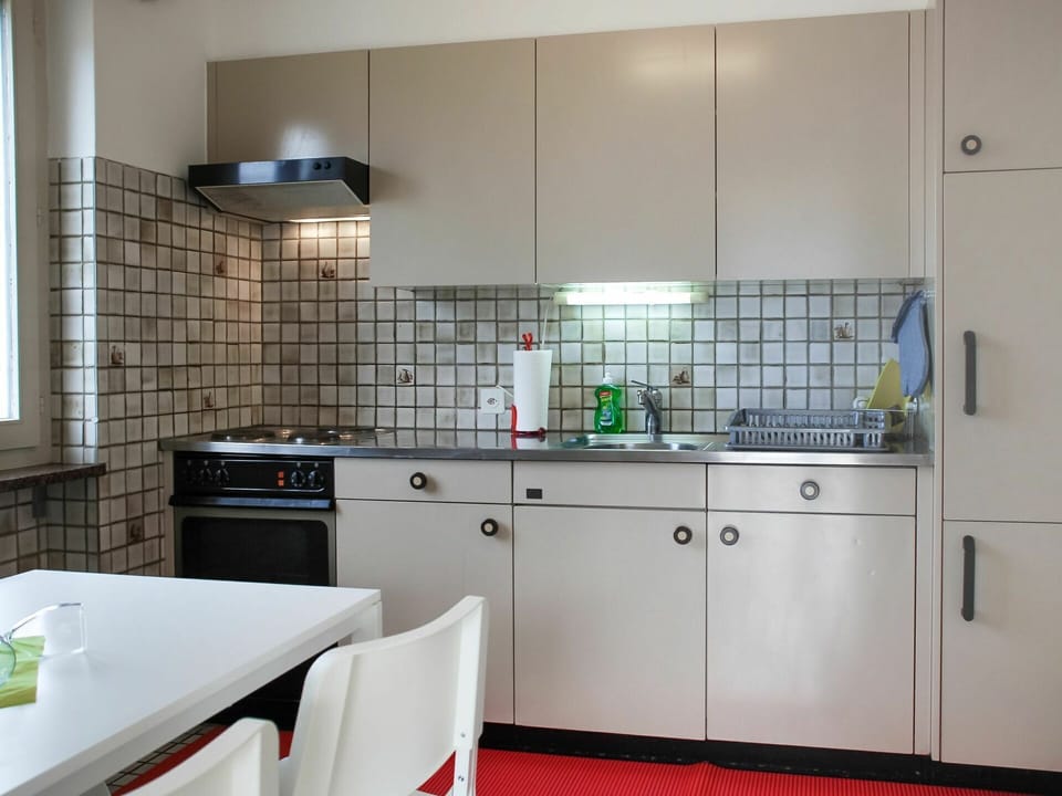 Tap, Countertop, Cabinetry, Kitchen Sink, Sink, Plumbing Fixture, Building, Kitchen, Kitchen Stove, Kitchen Appliance