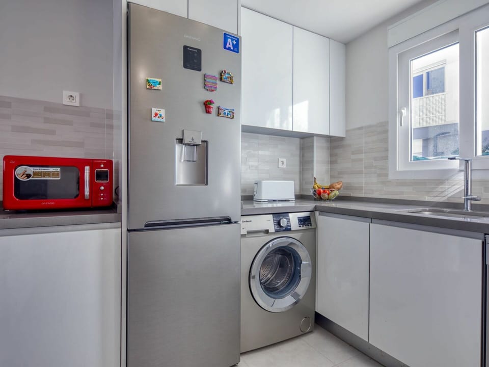 Washing Machine, Clothes Dryer, Window, Kitchen Appliance, Laundry, Home Appliance, Major Appliance, Cabinetry, Gas