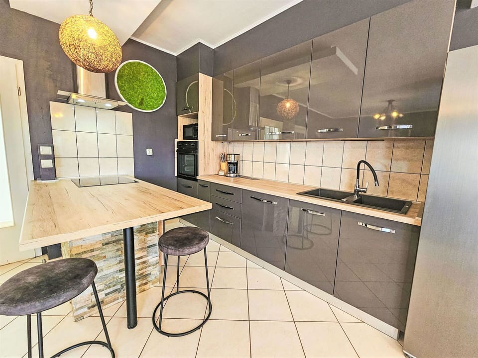 Countertop, Cabinetry, Furniture, Property, Kitchen, Drawer, Chair, Wood, Lighting, Sink