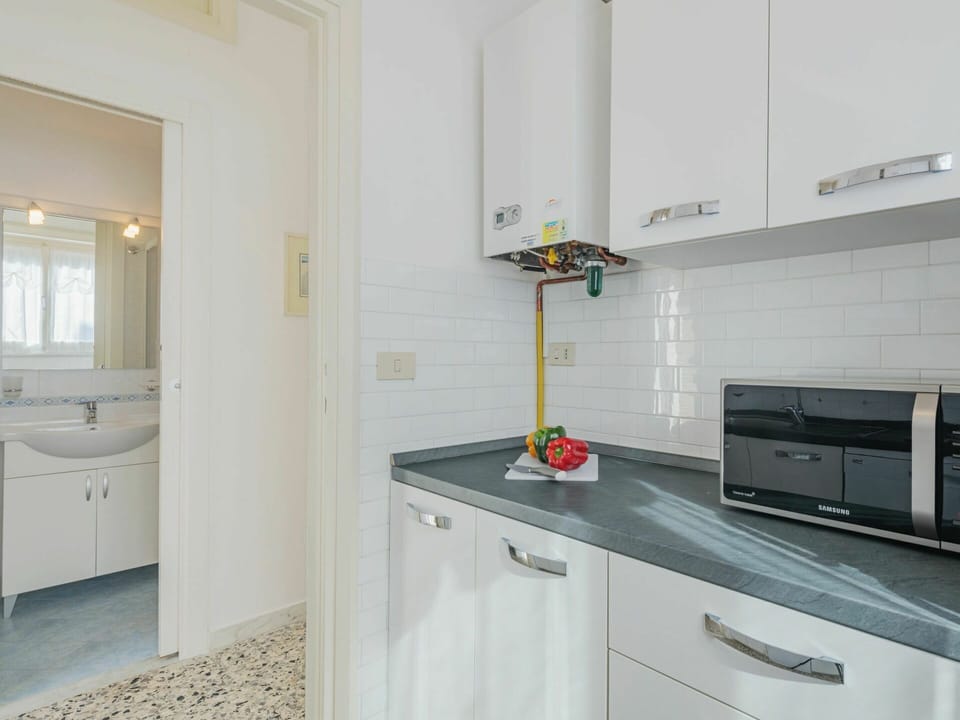 Cabinetry, Furniture, Countertop, Property, Building, Bathroom Cabinet, Tap, Drawer, Mirror, Interior Design