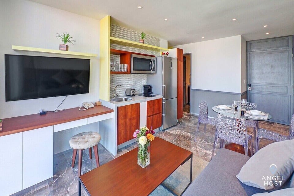 Open kitchen-living-dining space to enjoy when it’s time to relax