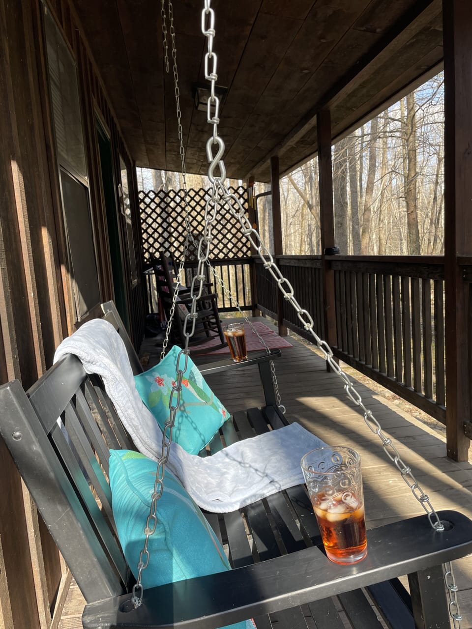 Spacious covered porch for relaxing, even on a rainy day.