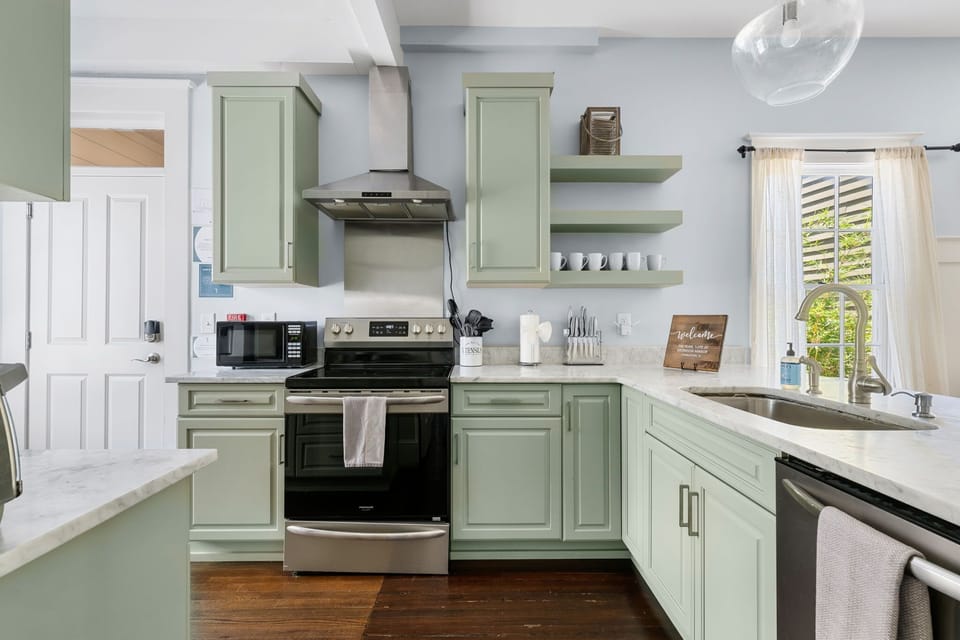 Modern kitchen with stainless steel appliances for all your cooking needs.