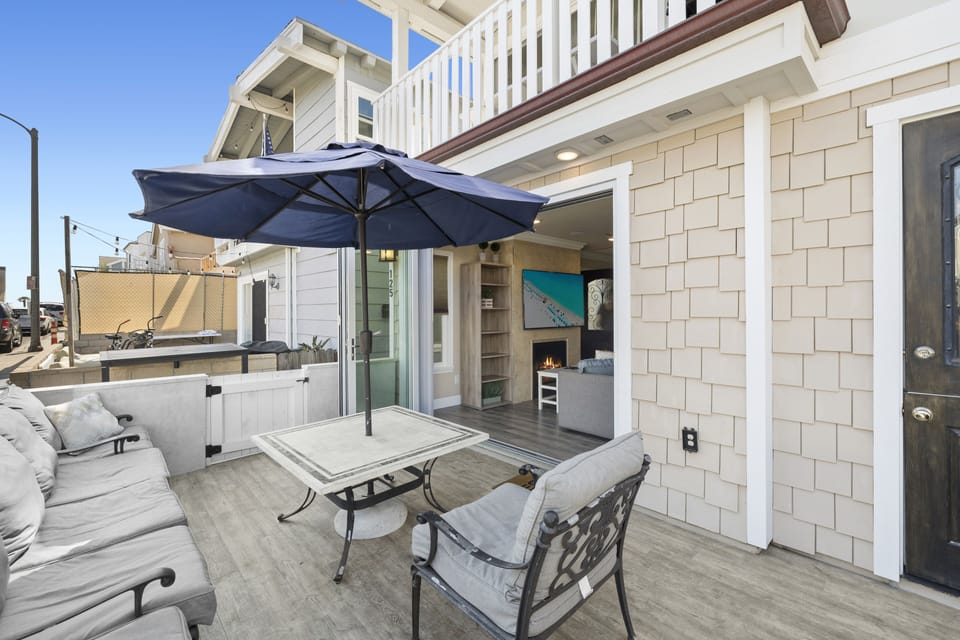 Big patio with lots of seating for the whole family! BBQ, relax, people watch.