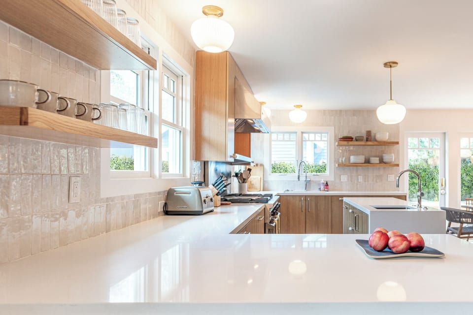 Kitchen features 6 burner Vking commercial stove, SubZero fridge, Miele dishwasher etc...