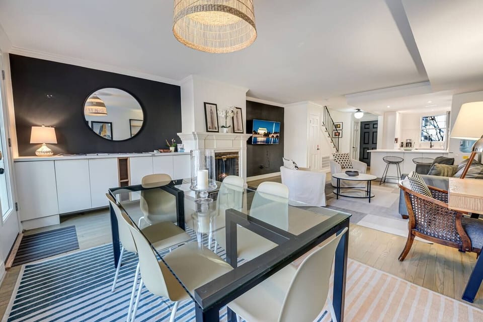 Dining/Living Room: Rear Patio Entrance, Open Concept Kitchen.