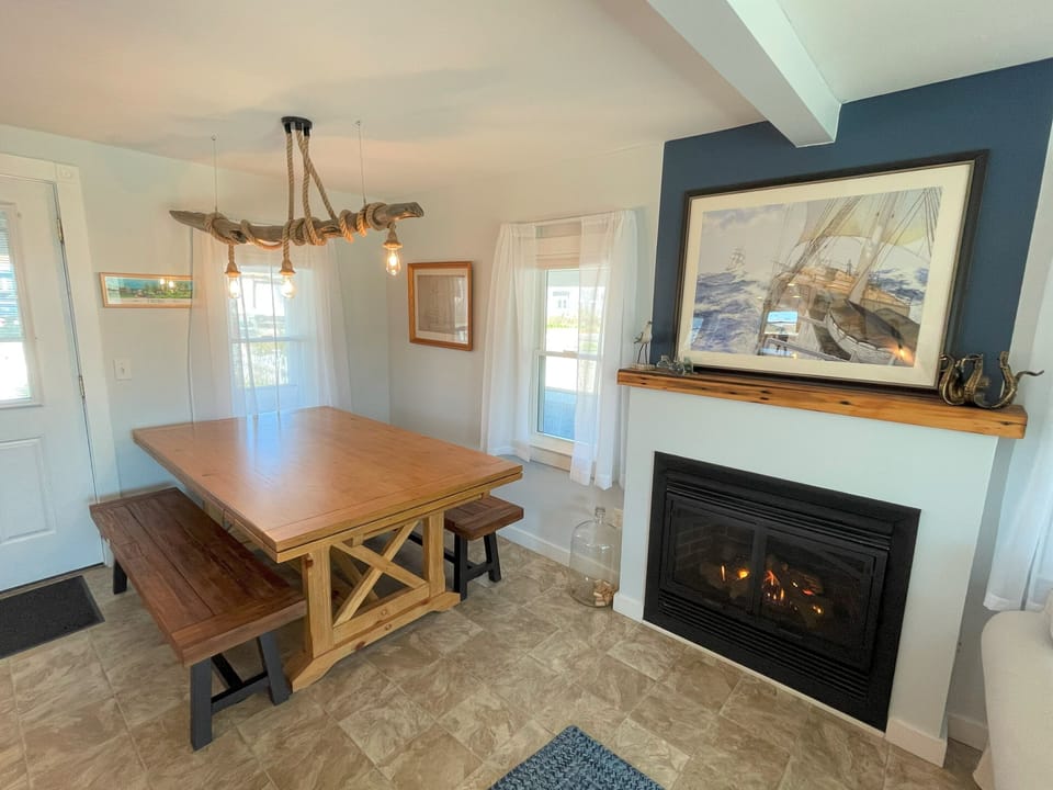We have a dining area with a table that seats six guests comfortably.