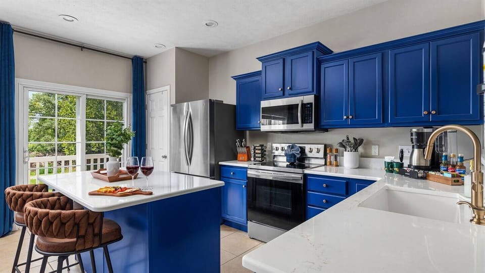 Fully stocked kitchen on the 1st floor with stainless steel appliances