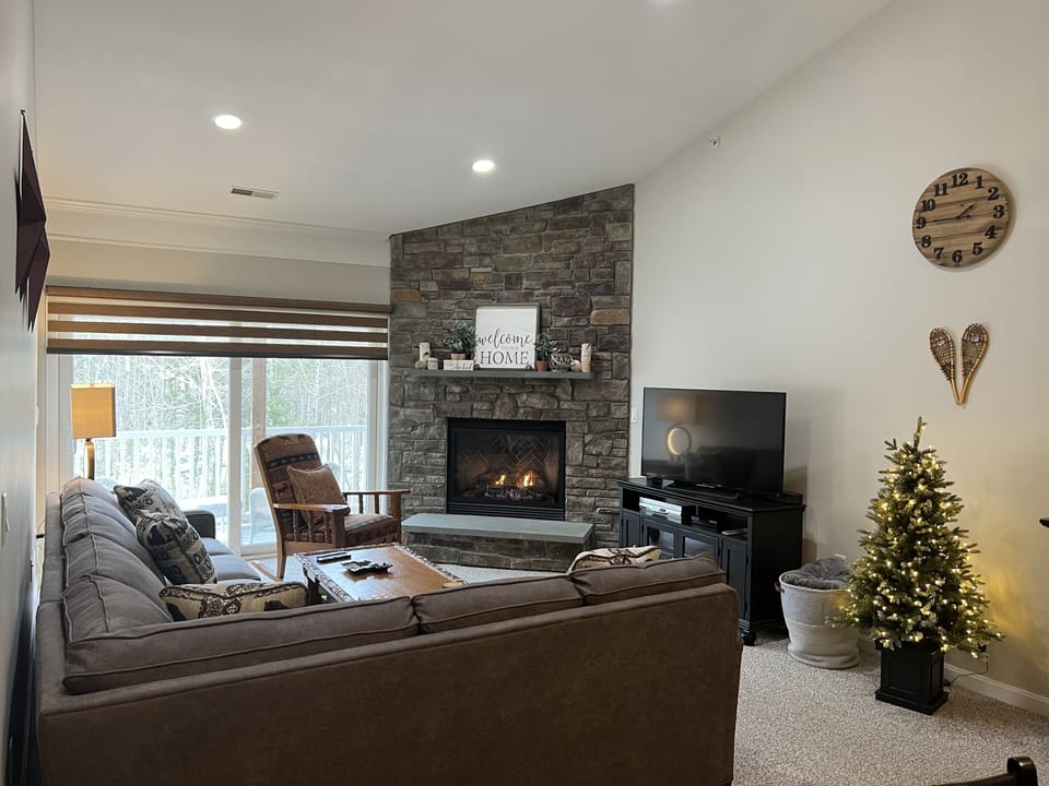 Gas fire place, new oversized sectional sofa.