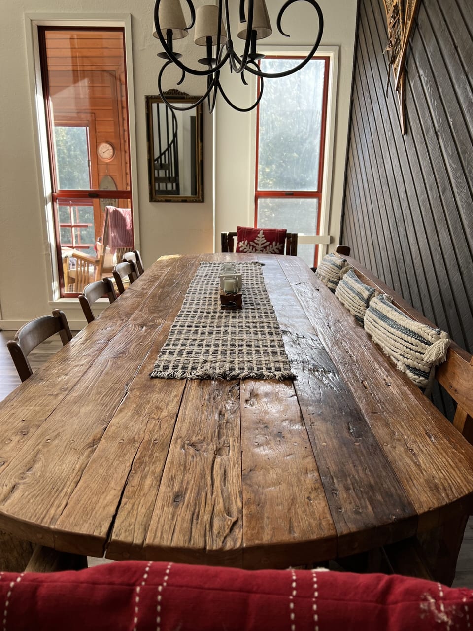 Large, rustic dining table easily seats your entire family.
