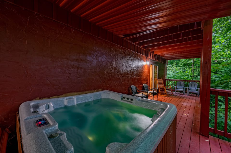 Extra seating by the hot tub for those who want to stay dry