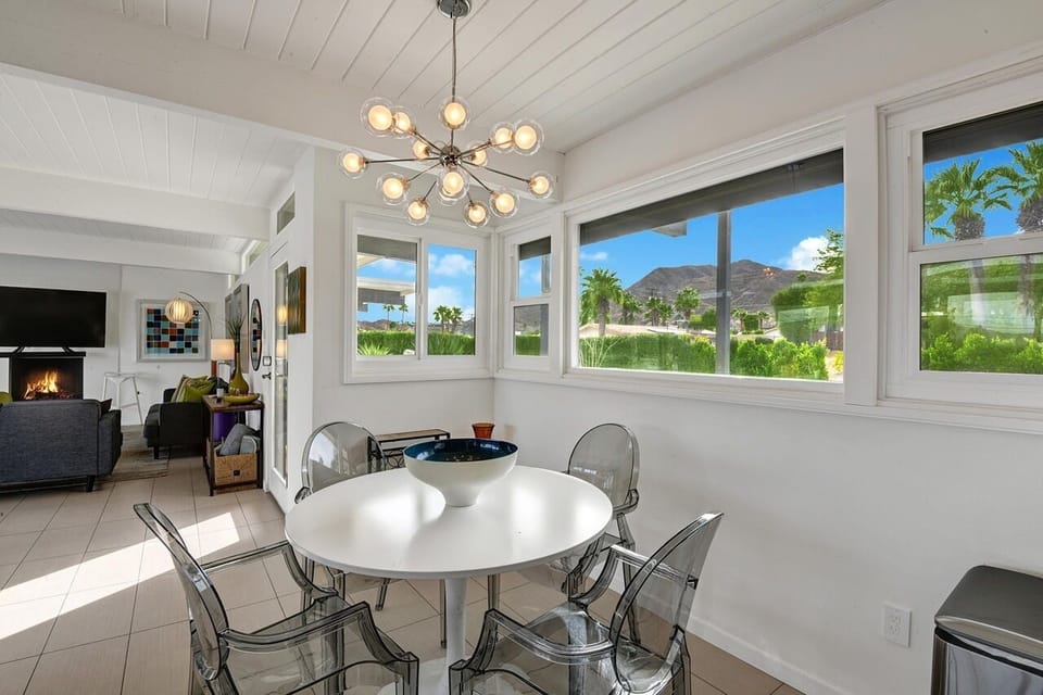 This table for 4 easily seats 6 for meals or game-time!