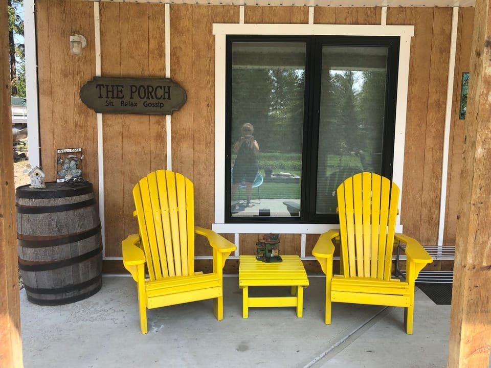  Back patio seating area under covered deck.