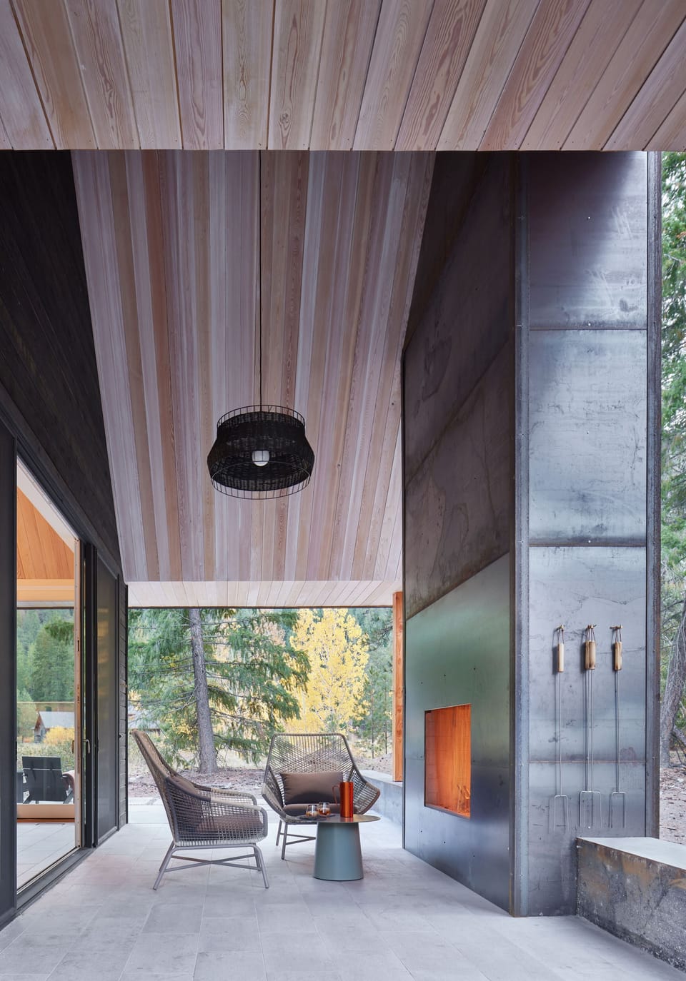 Lake porch features a wood burning fireplace.