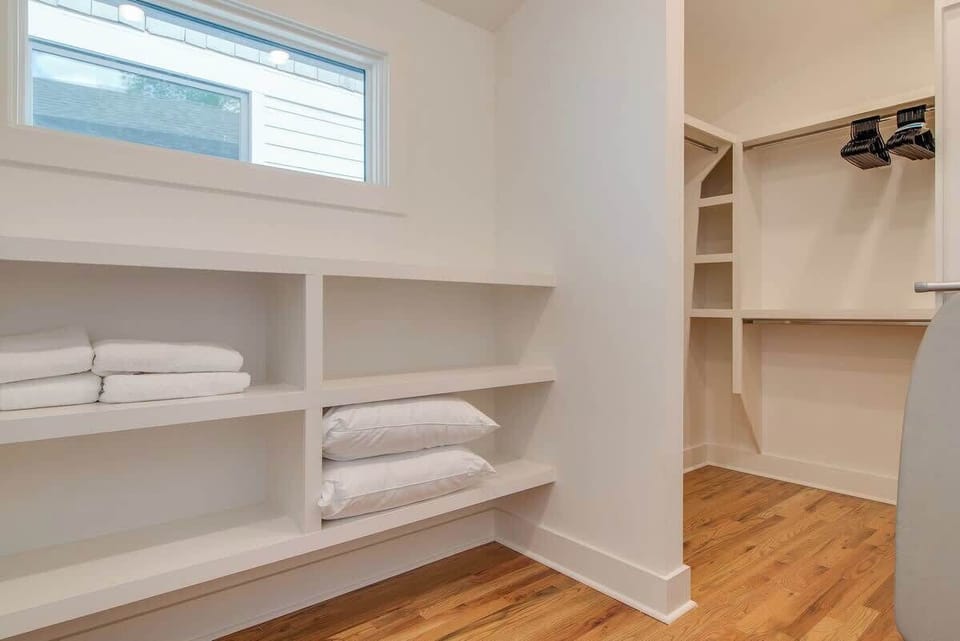 The primary closet is large enough to fit everyone's suitcases and then some!