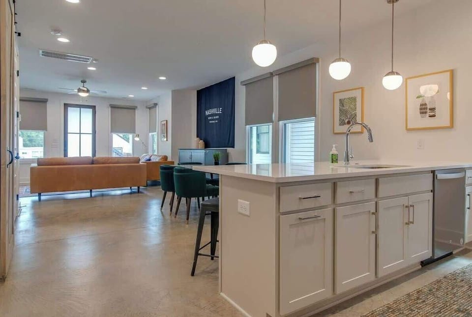 The open floor plan is perfect for entertaining while you visit Music City with your guests! And even has a queen murphy bed for extra sleeping space!