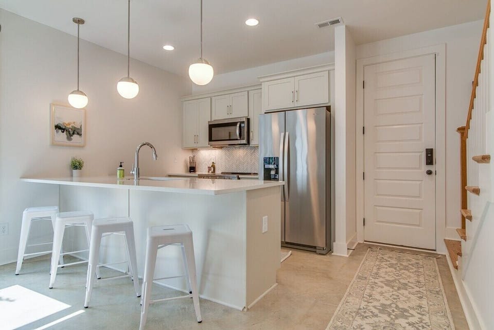 Enjoy casual meals and conversations with bar seating at the kitchen counter!