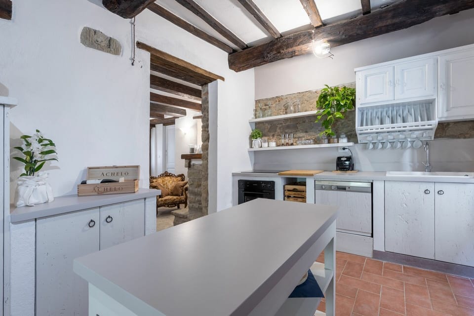 Cabinetry, Countertop, Property, Furniture, Table, Plant, Kitchen Sink, Kitchen Appliance, Kitchen Stove, Kitchen