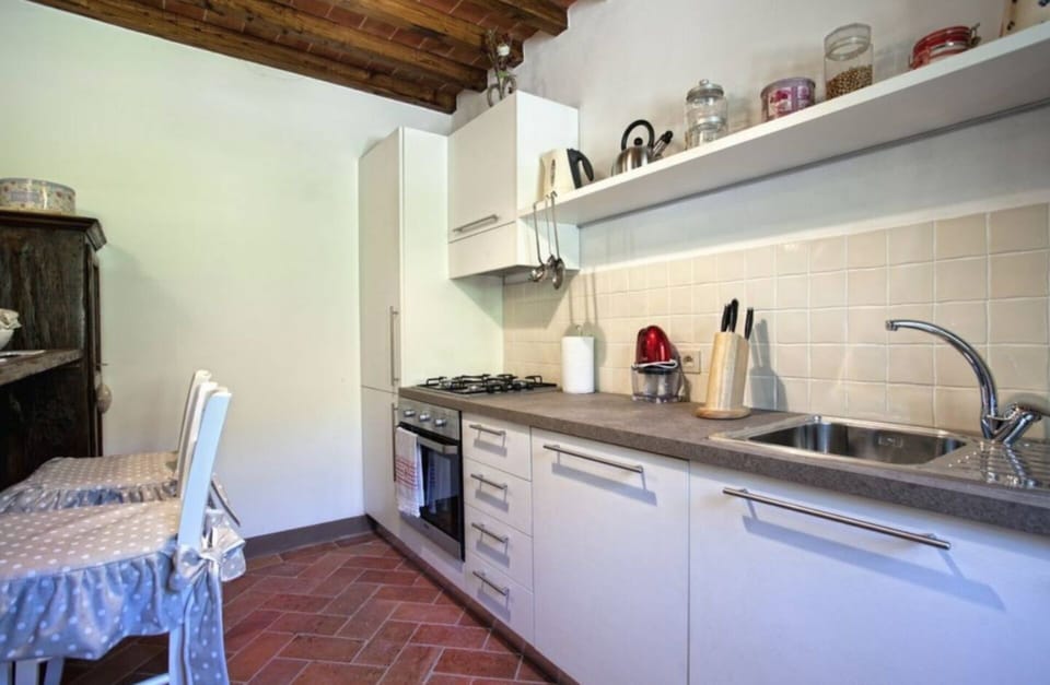 Cabinetry, Kitchen Sink, Sink, Countertop, Tap, Building, Kitchen, Kitchen Stove, Wood, Lighting