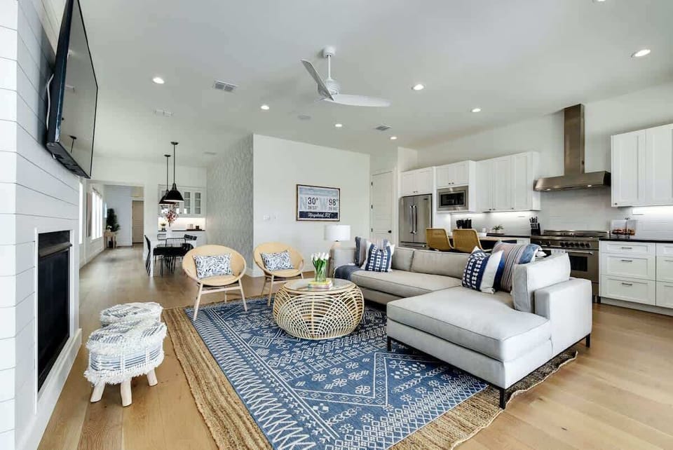 The living area opens to the kitchen and has beautiful views of the lake!