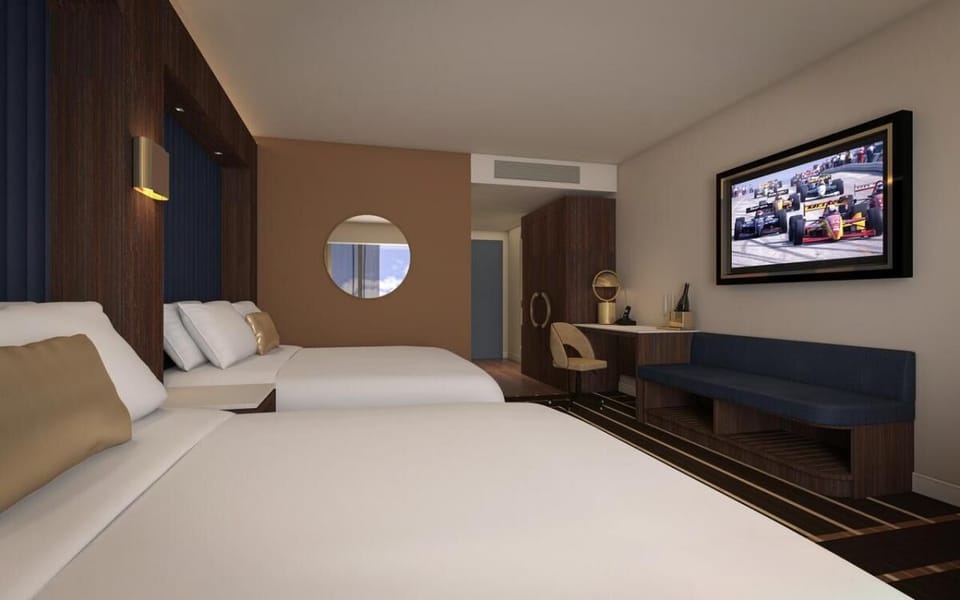 Drift off peacefully in crisp beds under warm, ambient lighting.