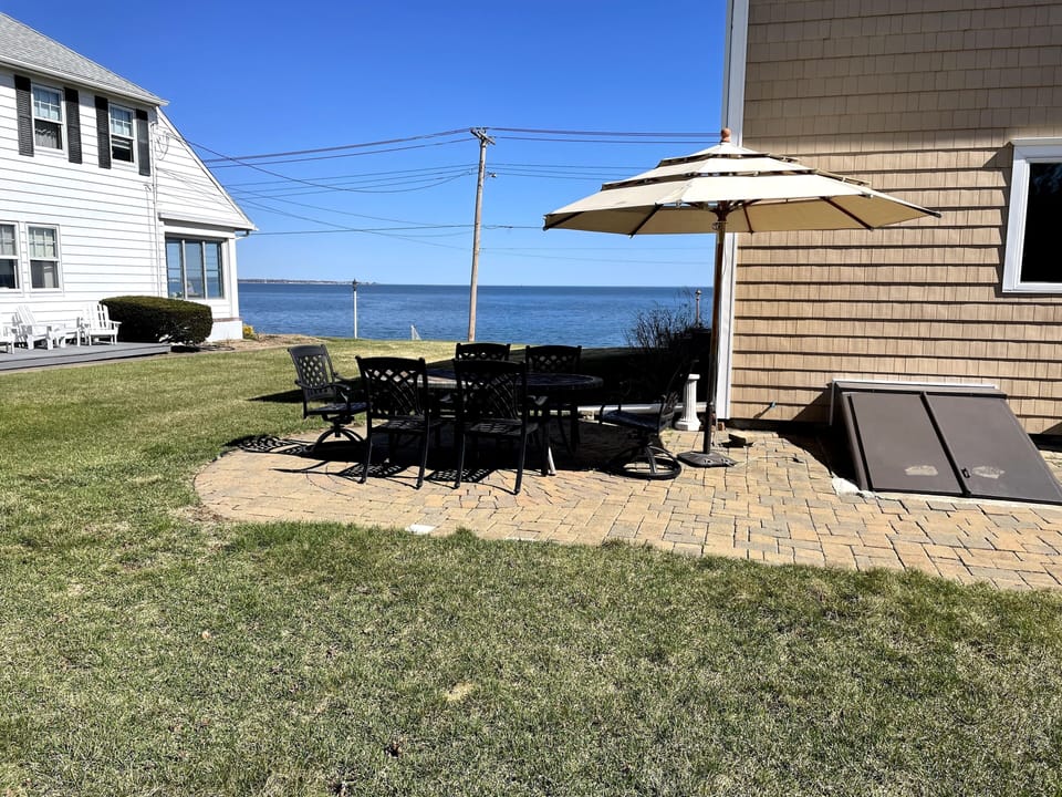 Spectacular patio for summer meals with plenty of space for lawn games