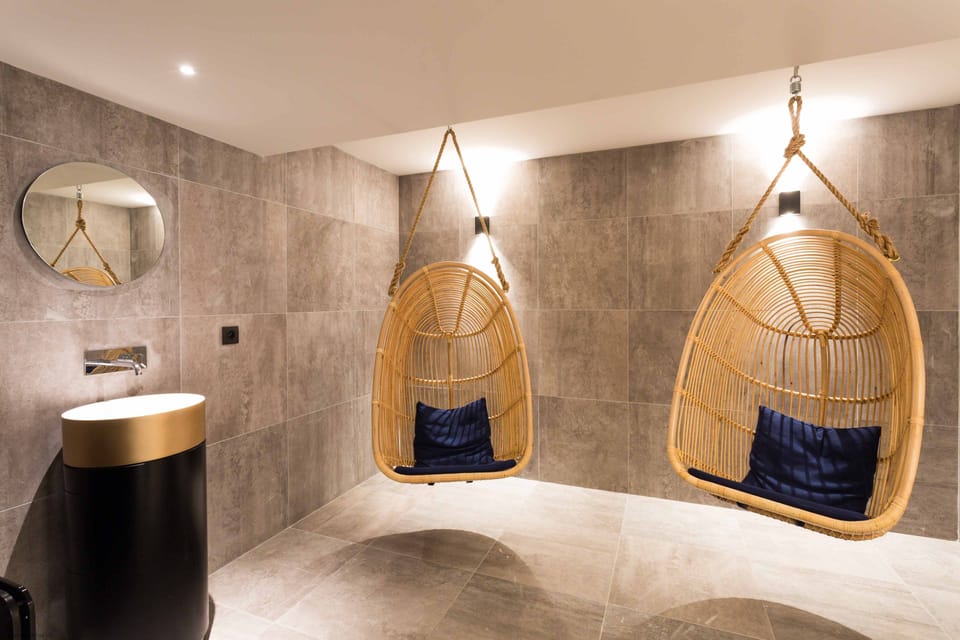 If you have to wait for the sauna, grab a seat in an 'egg'