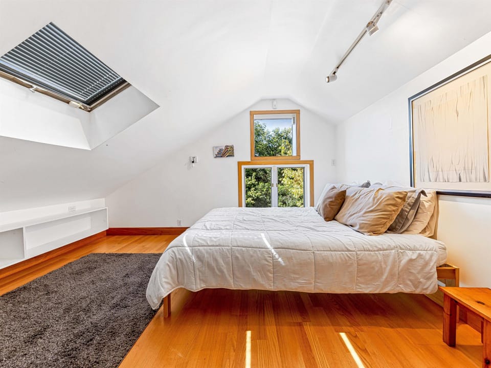 Loft accessed via stairs in bedroom 3 (or the climbing wall & firemen's pole!)