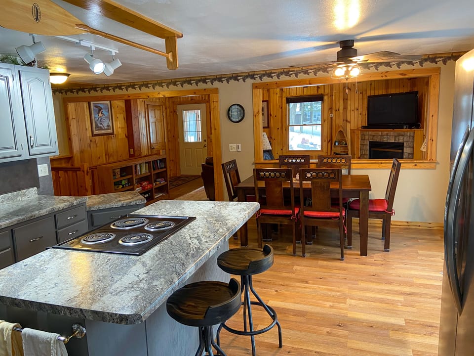 Fully equipped kitchen with island seating and ample prep space.