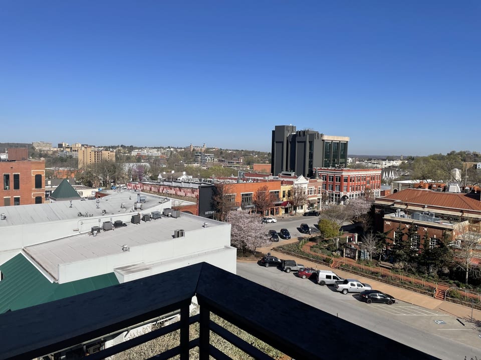 Balcony view of square & old main. 