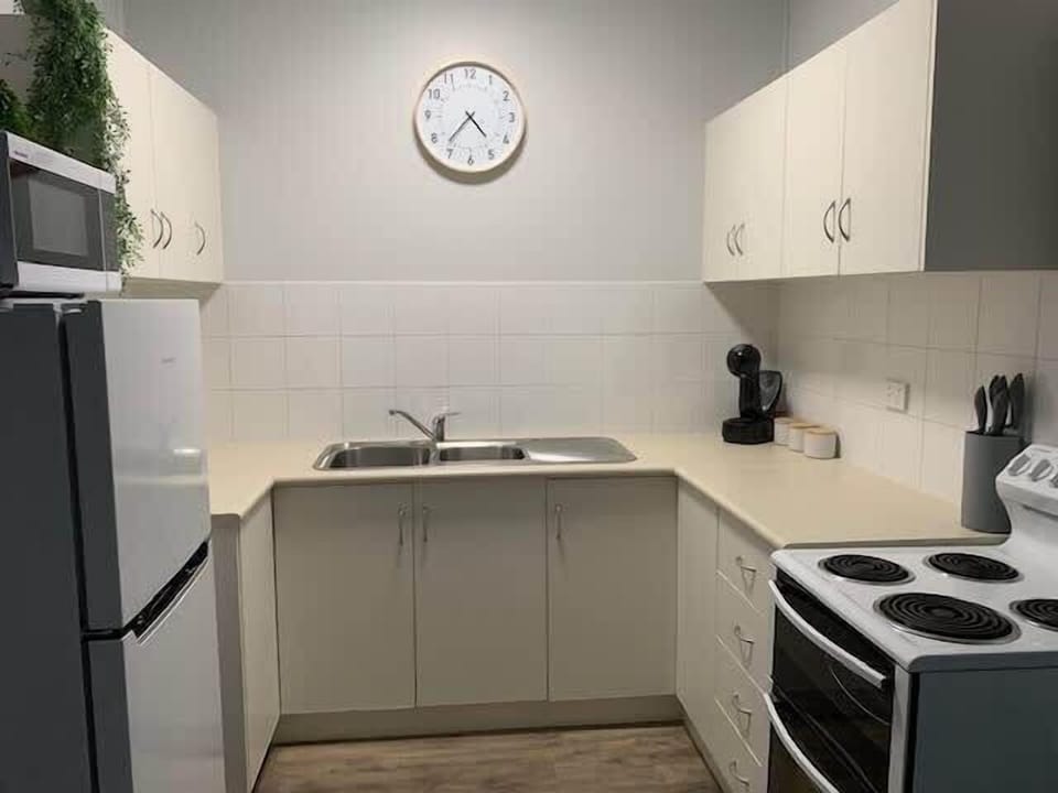Cook up a meal in this fully equipped kitchen.