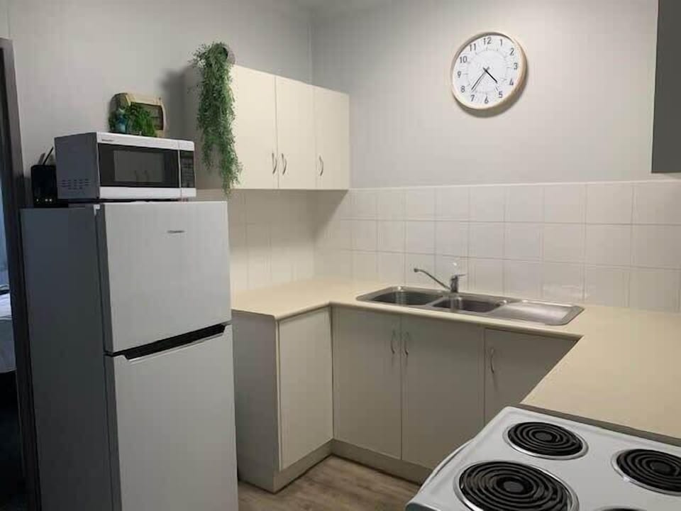 This fully equipped kitchen also boasts a coffee machine, microwave, full-sized oven and good sized fridge.