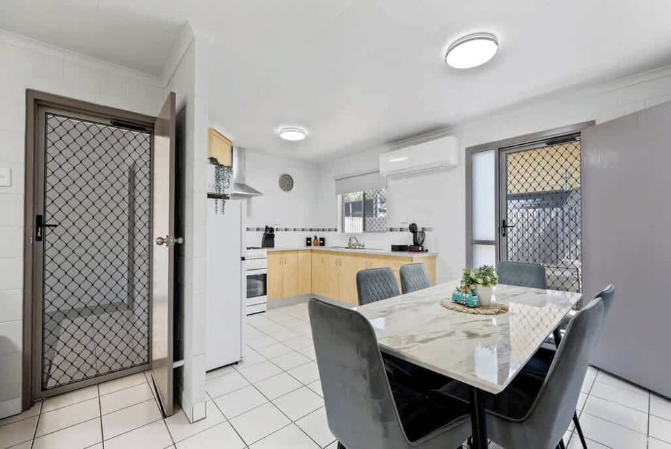 Enjoy easy access from the carport to the kitchen and out to the spacious outdoor courtyard, perfect for BBQs and relaxing in the fresh air. Moving between spaces is a breeze, making your stay convenient and enjoyable!