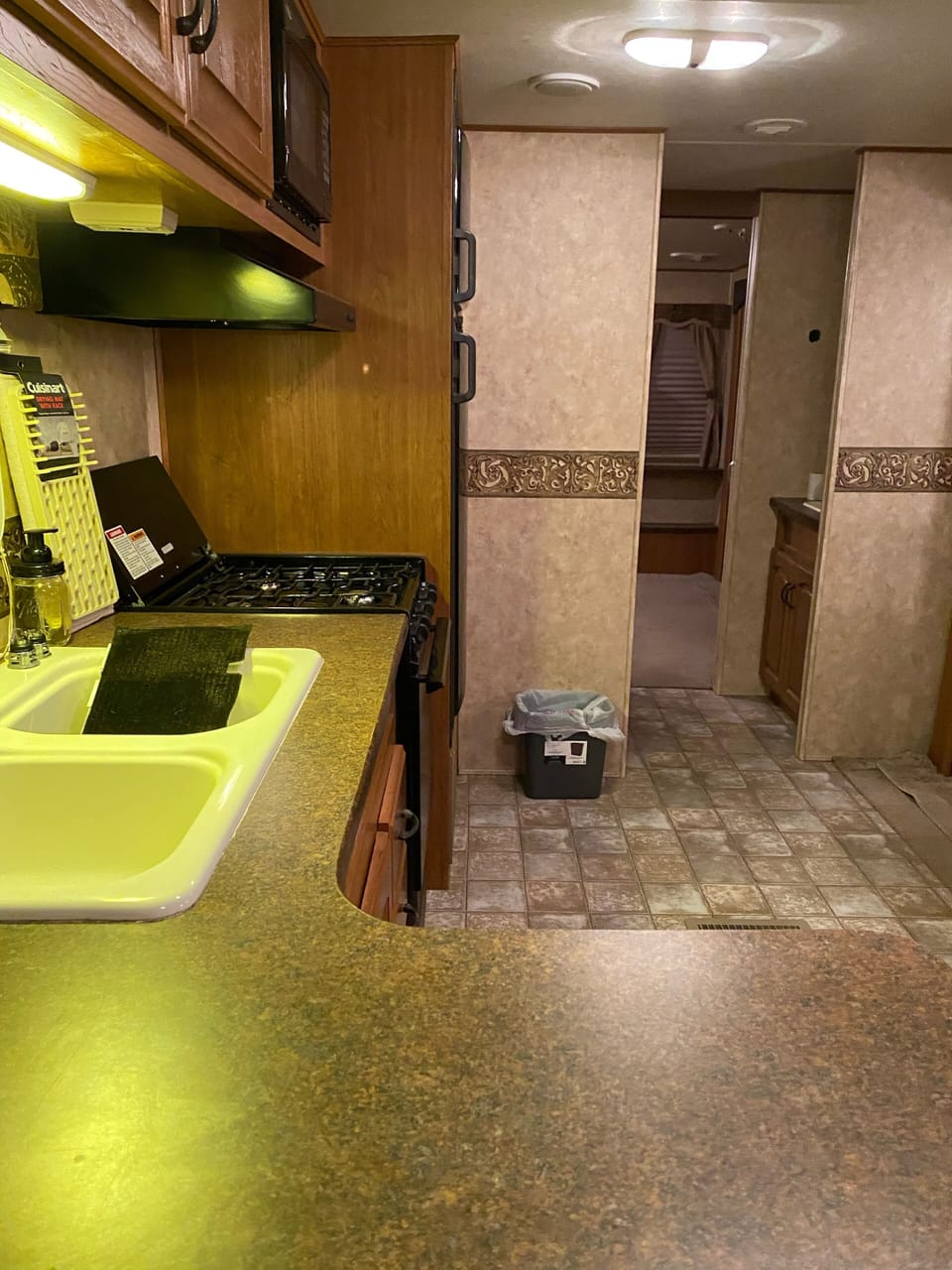Kitchen walking in the door .