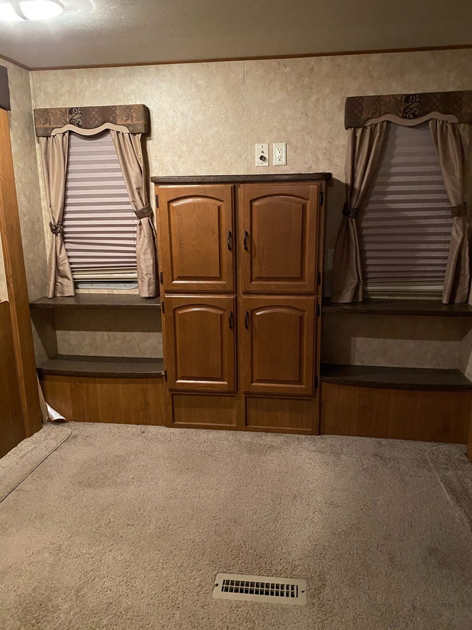 This is a back room more beds but we are putting a futon for watching T.V . 