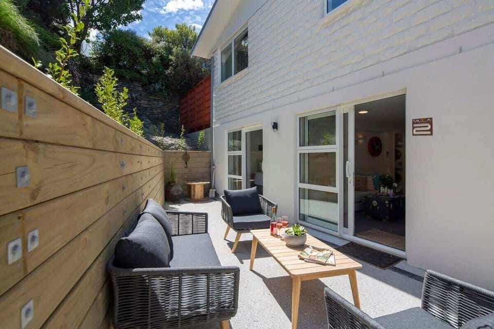Private Patio with Outdoor Seating
Step out onto the private patio, complete with comfortable seating, ideal for unwinding and enjoying the fresh air. Whether you’re reading, dining, or simply relaxing, this sunny space offers a peaceful retreat.