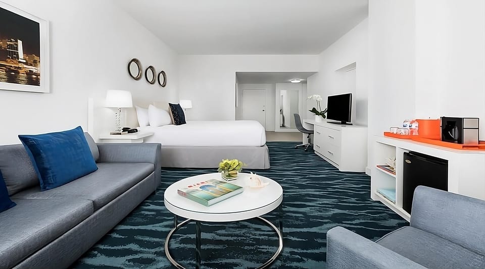 Gather for conversation in a spacious suite with stylish seating.
