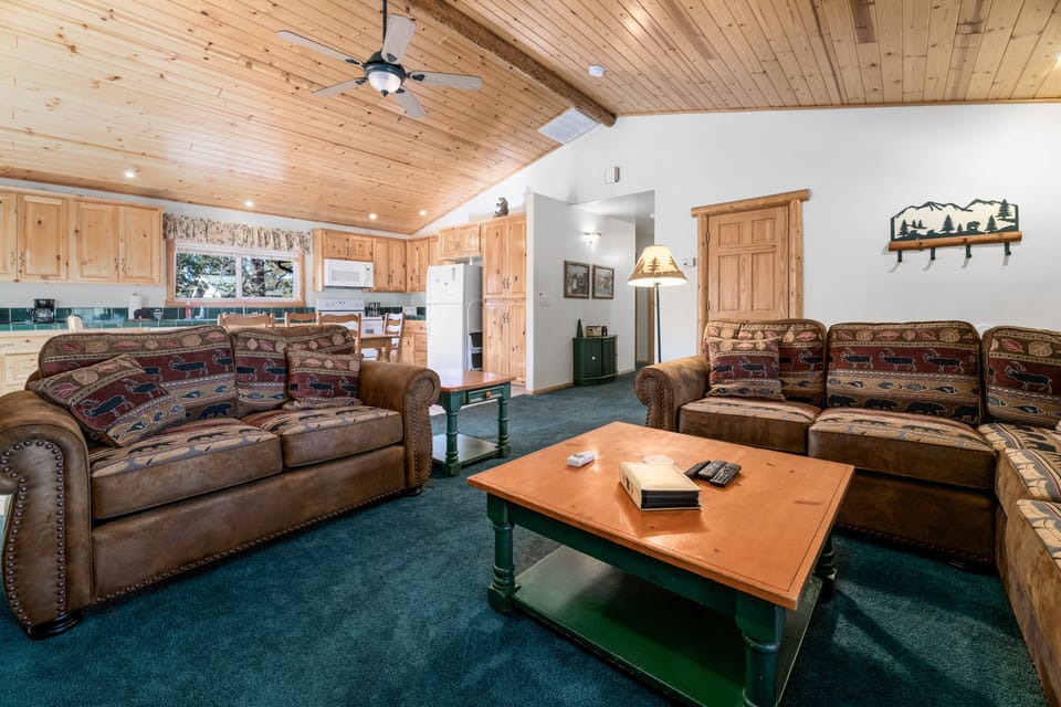 Living Room. - Adorable Living Room with plenty of comfy seating, a fireplace and a Flat screen TV!